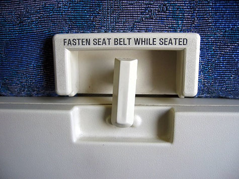 Please return your tray tables to their full, upright position